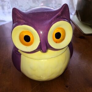 Avon Purple and Yellow Ceramic Owl Figurine which is a measuring cup